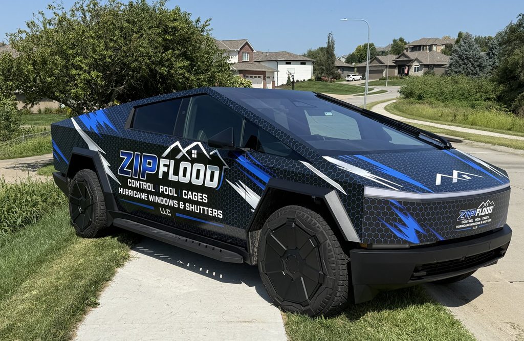Zip Flood Control Cybertruck parked on a neighborhood street